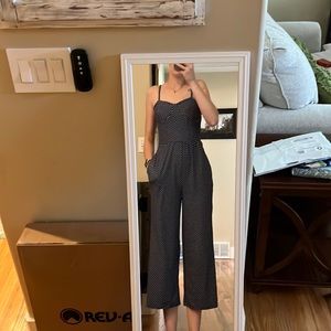 Navy blue jumper with white pokadots